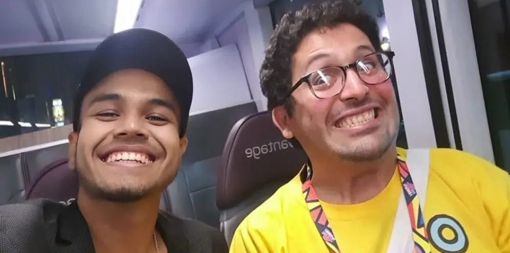 two people taking a selfie and smiling
